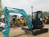 2022 Kobelco SK55 mini excavator, side profile view