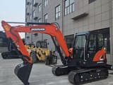 2024 Doosan DX60-9C mini excavator, side view