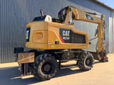 2017 Caterpillar M315F wheel excavator, rear three-quarter view