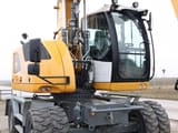 2023 Liebherr A916 Compact Litronic wheel excavator, front three-quarter view
