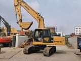 2018 Komatsu PC220-7 crawler excavator, side view