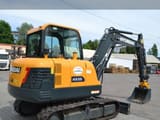 2021 Hyundai HX55 mini excavator rear three-quarter view