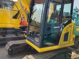 2022 Komatsu PC60-8 mini excavator, side view of the cab