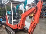 2001 Schaeff HR13 mini excavator, rear three-quarter view