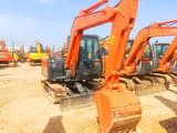 Hitachi ZX60 mini excavator, front three-quarter view