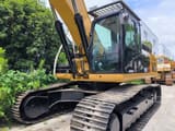Caterpillar 330D crawler excavator, front three-quarter view