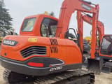 2021 Doosan DX80 crawler excavator, rear three-quarter view