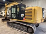 2014 Caterpillar 316EL crawler excavator, side view
