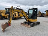 2021 Caterpillar 303.5E mini excavator, side profile view
