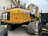2023 Caterpillar 330D2 crawler excavator, rear three-quarter view