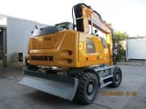 2023 Liebherr A916 Litronic wheel excavator, rear three-quarter view
