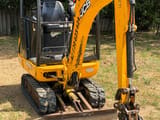 JCB 8014 CTS mini excavator, front three-quarter view