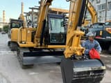 2023 Caterpillar 307 mini excavator, front three-quarter view