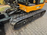 2024 JCB 86C-2 mini excavator side view of tracks and cab