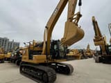 2023 Caterpillar 320GC crawler excavator, front three-quarter view