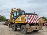 2007 Komatsu PW140-7 wheel excavator, rear three-quarter view