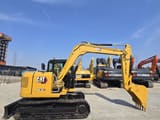 2023 Caterpillar 308.5E2 mini excavator, side profile view
