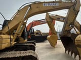 Гусеничный экскаватор 2008 Caterpillar 320D, вид сбоку