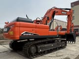 2024 Doosan DX340LCA crawler excavator, rear three-quarter view