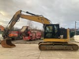2018 Caterpillar 325FL crawler excavator, side profile view