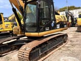 Caterpillar 323D crawler excavator, side view