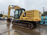 2018 Caterpillar 320GC crawler excavator, rear three-quarter view