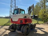 2018 Takeuchi TB295W wheel excavator, rear three-quarter view