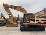 2023 Caterpillar 320BL crawler excavator, side profile view