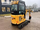 2024 Caterpillar 301.8 mini excavator, rear three-quarter view