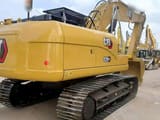 2022 Caterpillar 320GX crawler excavator, rear three-quarter view