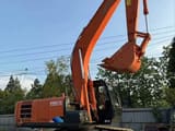 Hitachi ZAXIS 210 crawler excavator, side view