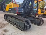 2024 Volvo EC210D crawler excavator, rear three-quarter view