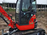 Kubota U-35 mini excavator, side view