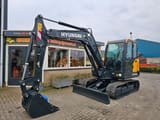 2025 Hyundai HX60PRO mini excavator, side profile view