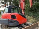 2017 Kubota KX080-4 mini excavator rear three-quarter view