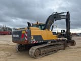 2012 Volvo EC220DL crawler excavator, rear three-quarter view