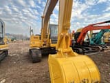 Komatsu PC110 crawler excavator, front view of bucket and boom