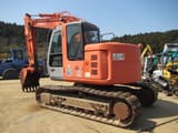 2004 Hitachi ZX135USK crawler excavator, rear three-quarter view