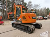 2018 Doosan DX140LCR-5 crawler excavator, rear three-quarter view