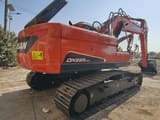 2024 Doosan DX225LCA crawler excavator, rear three-quarter view
