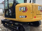 2024 Caterpillar 307E2 mini excavator rear three-quarter view