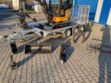 Berger Kraus BK2000NKSR mini excavator on trailer with attachments