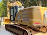 2022 Caterpillar 333 crawler excavator, rear three-quarter view