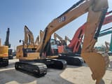 2024 Caterpillar 320GC crawler excavator, side profile view