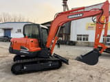 2023 Doosan DX60-9C crawler excavator, side view