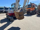 2017 Takeuchi TB260 mini excavator, rear three-quarter view