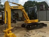 Komatsu PC-55MR mini excavator, side view