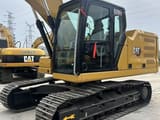 2023 Caterpillar 320GC crawler excavator, side profile view