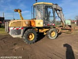 2002 Mecalac 12MXT wheel excavator, side view