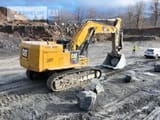 2019 Caterpillar 374FL crawler excavator, side view